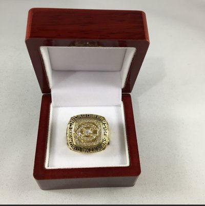 The NFL championship ring, suit the Chicago cubs-2